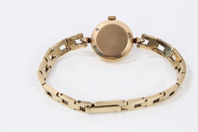 Lot 385 - 9ct gold Garrard wristwatch on a yellow metal (333) bracelet