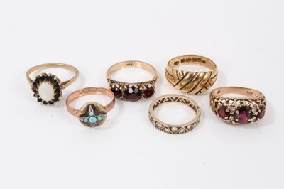 Lot 576 - Six gold and gem set dress rings