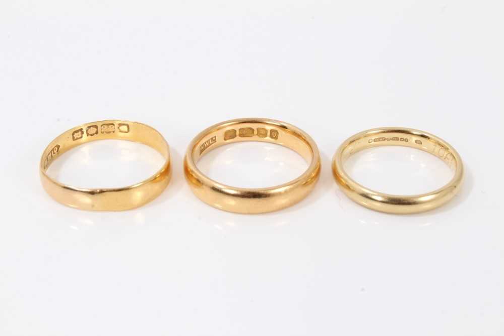 Lot 377 - Two 22ct gold wedding rings and 18ct gold wedding ring (3)