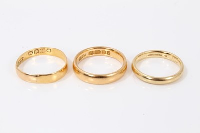 Lot 377 - Two 22ct gold wedding rings and 18ct gold wedding ring (3)