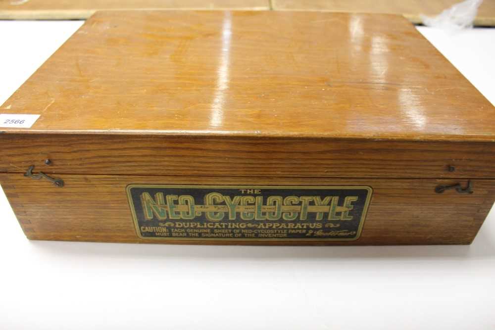Lot 2566 - A Neo-Cyclostyle copying machine by the Gestetner Manufacturing Company, in an oak case, 47cm across