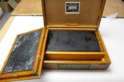 Lot 2566 - A Neo-Cyclostyle copying machine by the Gestetner Manufacturing Company, in an oak case, 47cm across
