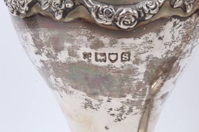 Lot 388 - Pair silver vases of tapering form with floral swag decoration