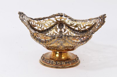 Lot 390 - Silver gilt pierced pedestal dish with floral swag decoration