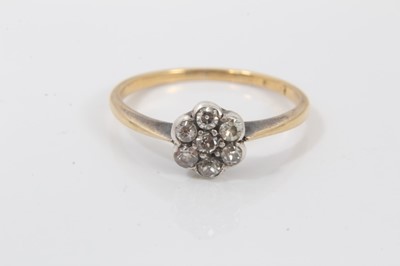 Lot 602 - Edwardian diamond cluster ring with a flower head cluster of seven old cut/single cut diamonds