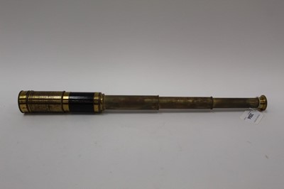Lot 2594 - Antique brass three-drawer telescope, with mahogany support, sliding eyepiece and threaded cap