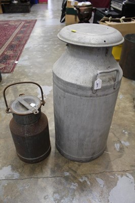 Lot 2611 - Vintage milk churn together with another vintage churn (2)