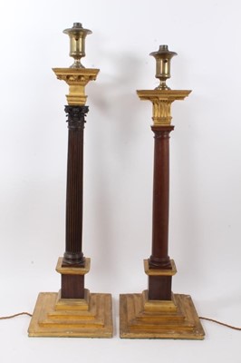 Lot 870 - Two large antique columns, one Corinthian and the other Doric, both mounted as table lamps and wired for electricity