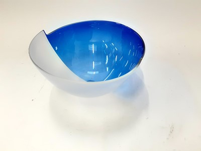 Lot 1312 - Contemporary art glass bowl by Ed Burke of E&M glass, half frosted and half blue with stepped rim, engraved signature to base, 24cm in diameter