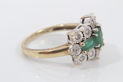 Lot 69 - 9t gold emerald and diamond cluster ring