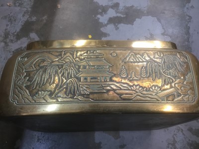 Lot 2706 - Late 19th century Chinese brass carriage warmer with ornate pierced cover and cast landscape decoration with swing carrying handle 40 cm wide