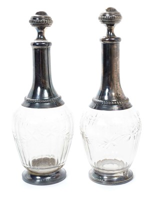 Lot 410 - Pair of French silver mounted decanters in fitted case