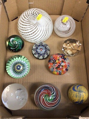 Lot 1134 - Good collection of ten glass paperweights, including a large example with white ribbon overlay, millefiori  examples, a one in the form of a globe, etc