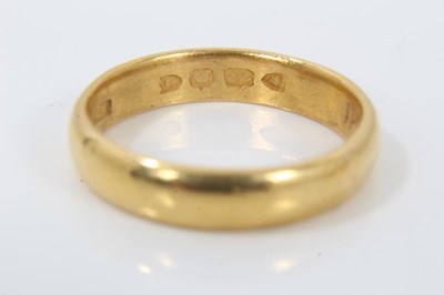 Lot 639 - Two 22ct gold wedding bands