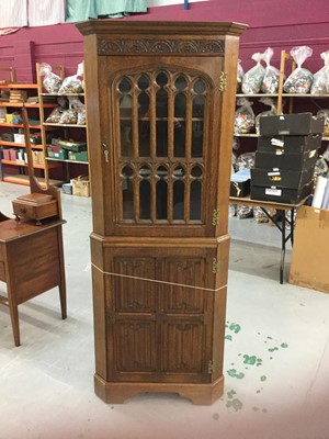 Lot 851 - Good quality gothic style oak two height corner cabinet by Frank Pratt of Derby