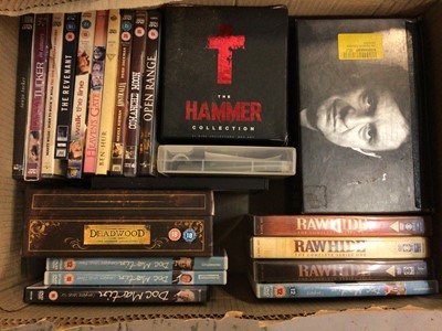 Lot 500 - 12 boxes of DVDs including boxed sets, Eternally Elvis, Poirot collection etc