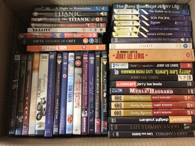 Lot 500 - 12 boxes of DVDs including boxed sets, Eternally Elvis, Poirot collection etc