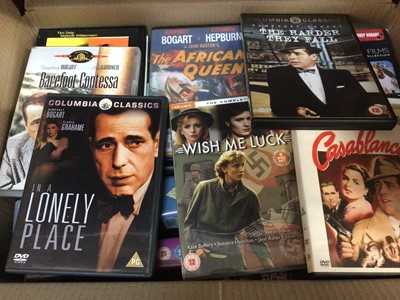 Lot 500 - 12 boxes of DVDs including boxed sets, Eternally Elvis, Poirot collection etc