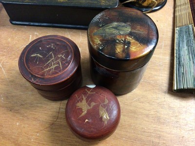 Lot 425 - Two Japanese papier-mâché boxes and string box, three other containers and four fans