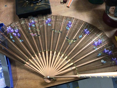 Lot 425 - Two Japanese papier-mâché boxes and string box, three other containers and four fans