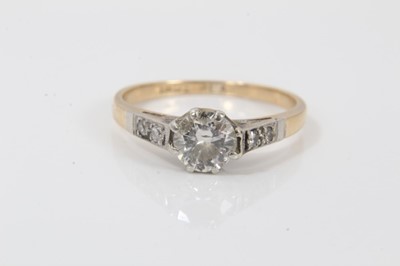 Lot 631 - 18ct diamond single stone ring in platinum setting with further diamonds to shoulders