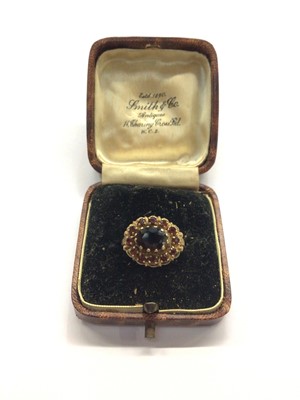 Lot 650 - 9ct gold garnet cluster ring