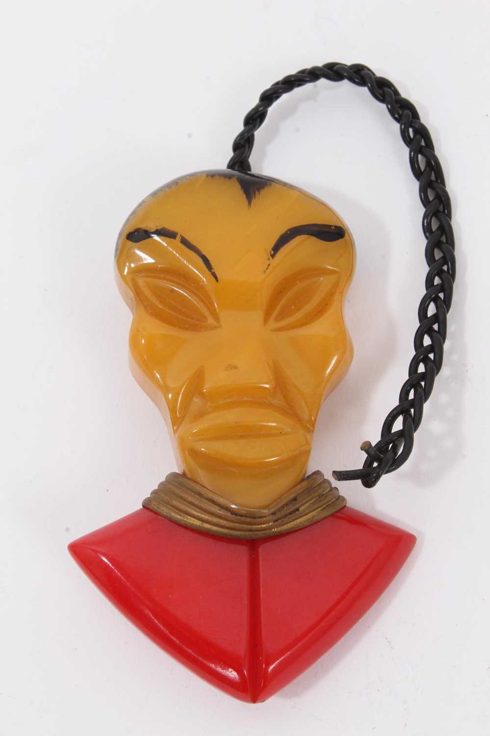 Lot 18 - Art Deco Bakelite Oriental figure brooch with rope plaited hair and brass necklace