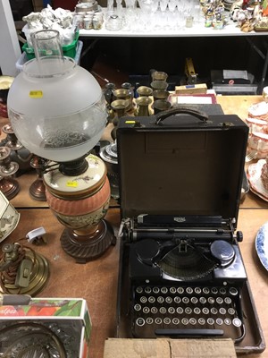 Lot 339 - Edwardian ceramic oil lamp with shade and a spare shade, together with an early 20th century Royal portable typewriter in case, two watercolours and two prints all in glazed frames