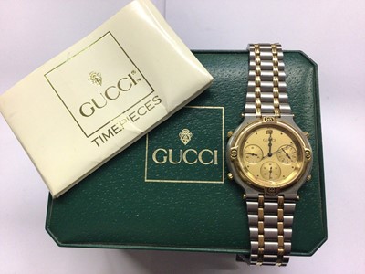 Lot 674 - Gucci stainless steel bi-metal wristwatch in box