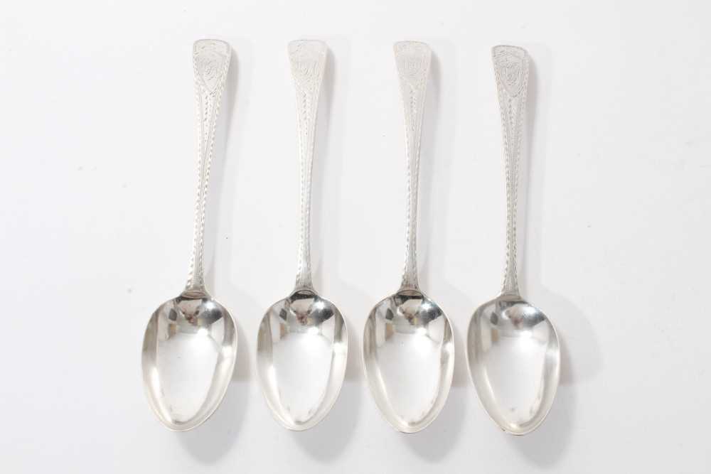 Lot 370 - Set of four bright cut silver table spoons by Hester Bateman