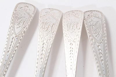 Lot 370 - Set of four bright cut silver table spoons by Hester Bateman