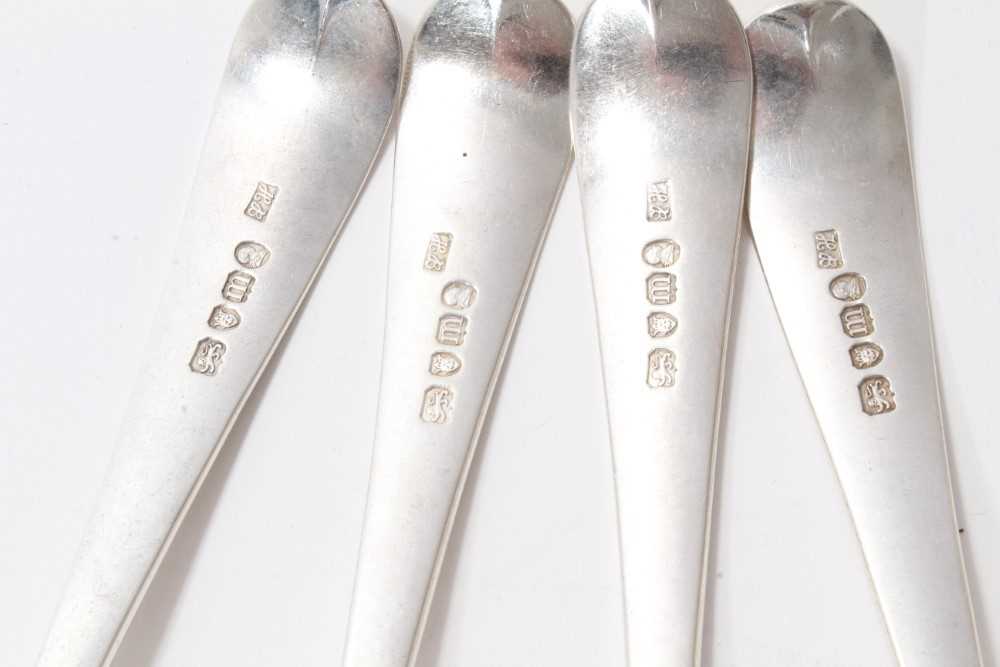 Lot 370 Set of four bright cut silver table spoons