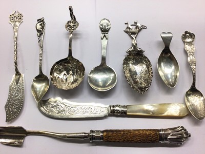 Lot 679 - Danish silver caddy spoon, together with other Continental silver cutlery, Stilton scoop, mother of pearl handled cheese knife etc