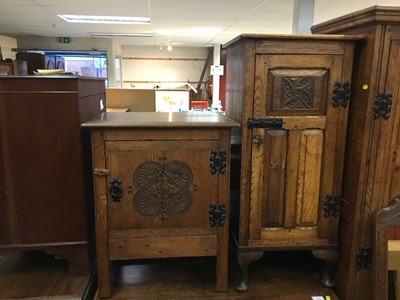 Lot 917 - Two 1950s Carolean revival carved oak bedside cupboards