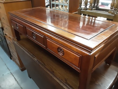 Lot 880 - Oriental hardwood low coffee table with three drawers, 122cm wide, 51cm deep, 41cm high