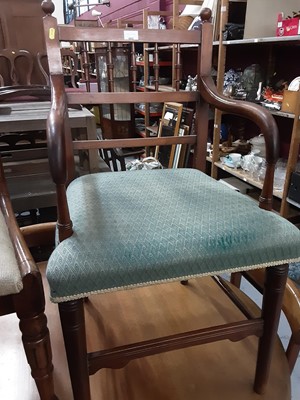 Lot 885 - Mahogany elbow chair with spindle back and padded seat on turned front legs