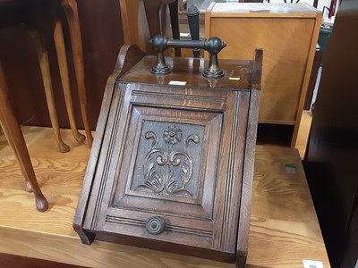 Lot 891 - Edwardian carved oak coal scuttle with shovel