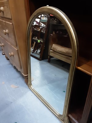 Lot 897 - Wall mirror in arched gilt frame, 90cm high, 66cm wide