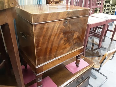 Lot 908 - Nineteenth century inlaid mahogany cellarette with flush brass carrying handles on turned legs and brass castors, 46cm wide, 32.5cm deep, 59cm high