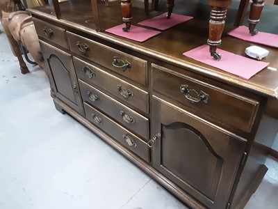 Lot 909 - Good quality oak sideboard with four central drawers flanked by a drawer and a cupboard to each side on bracket feet, 155cm wide, 45.5cm deep, 62cm high