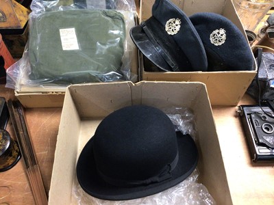 Lot 428 - Unopened post-war RAF uniform, two RAF hats, cap and vintage bowler hat