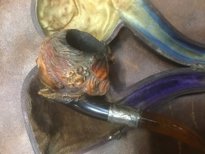 Lot 201 - Victorian cased meerschaum pipe with amber mouthpiece, the bowl carved in the form of a woman's face