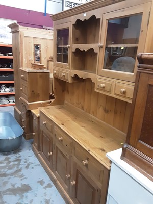 Lot 924 - Contemporary pine kitchen dresser with raised back, glazed cupboards and drawers, three drawers and three cupboards below 153 cm wide, 213 cm high, 46 cm deep