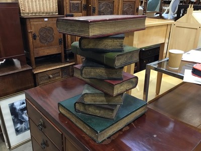 Lot 936 - Novelty wooden occasional table in the form of a stack of books, 51 cm high